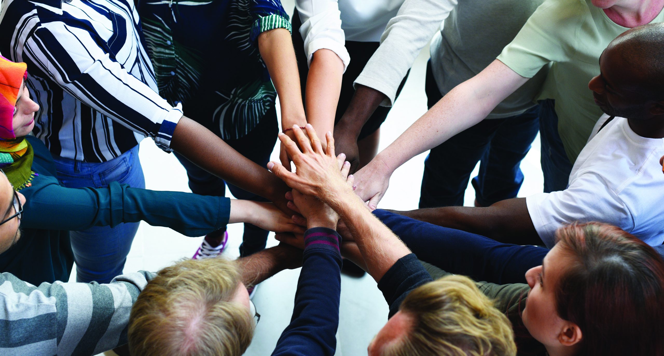 Rolle IT hands in working together Rolle IT hands in working together